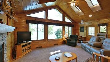 Room, Multiple Beds, Patio, Beach View | Living area | 32-inch TV with cable channels