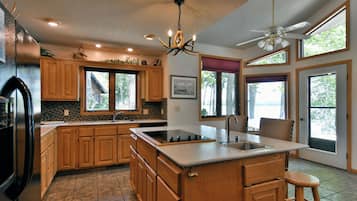 House, Multiple Beds, Jetted Tub (Cheif Lake Lodge) | Private kitchen | Fridge, microwave, oven, stovetop