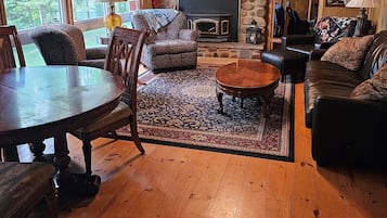 Room, Multiple Beds, Patio | Living area | 32-inch TV with cable channels, fireplace