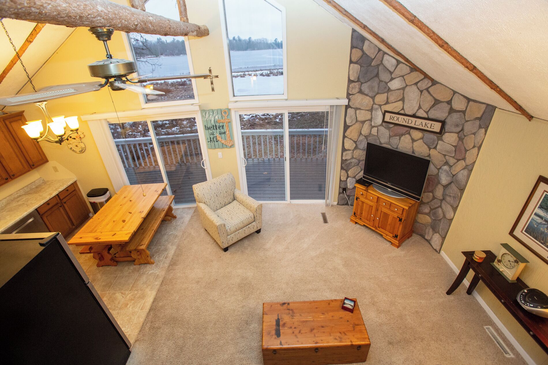 Cabin, Multiple Beds, Patio | Living area | 32-inch TV with cable channels, fireplace