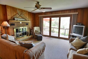 Room, Multiple Beds, Patio | Living room | 32-inch TV with cable channels, fireplace - Tranquility Court (Hayward)