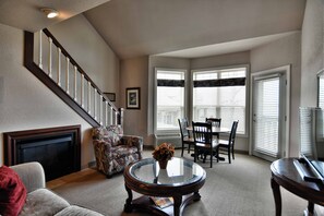 Condo, Multiple Beds, Balcony | Living room | 32-inch TV with cable channels, fireplace, MP3 dock - Unit 317 Tagalong Condo (Birchwood)