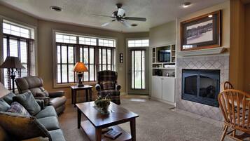 Condo, 1 Queen Bed with Sofa bed, Jetted Tub | Living area | 32-inch TV with cable channels