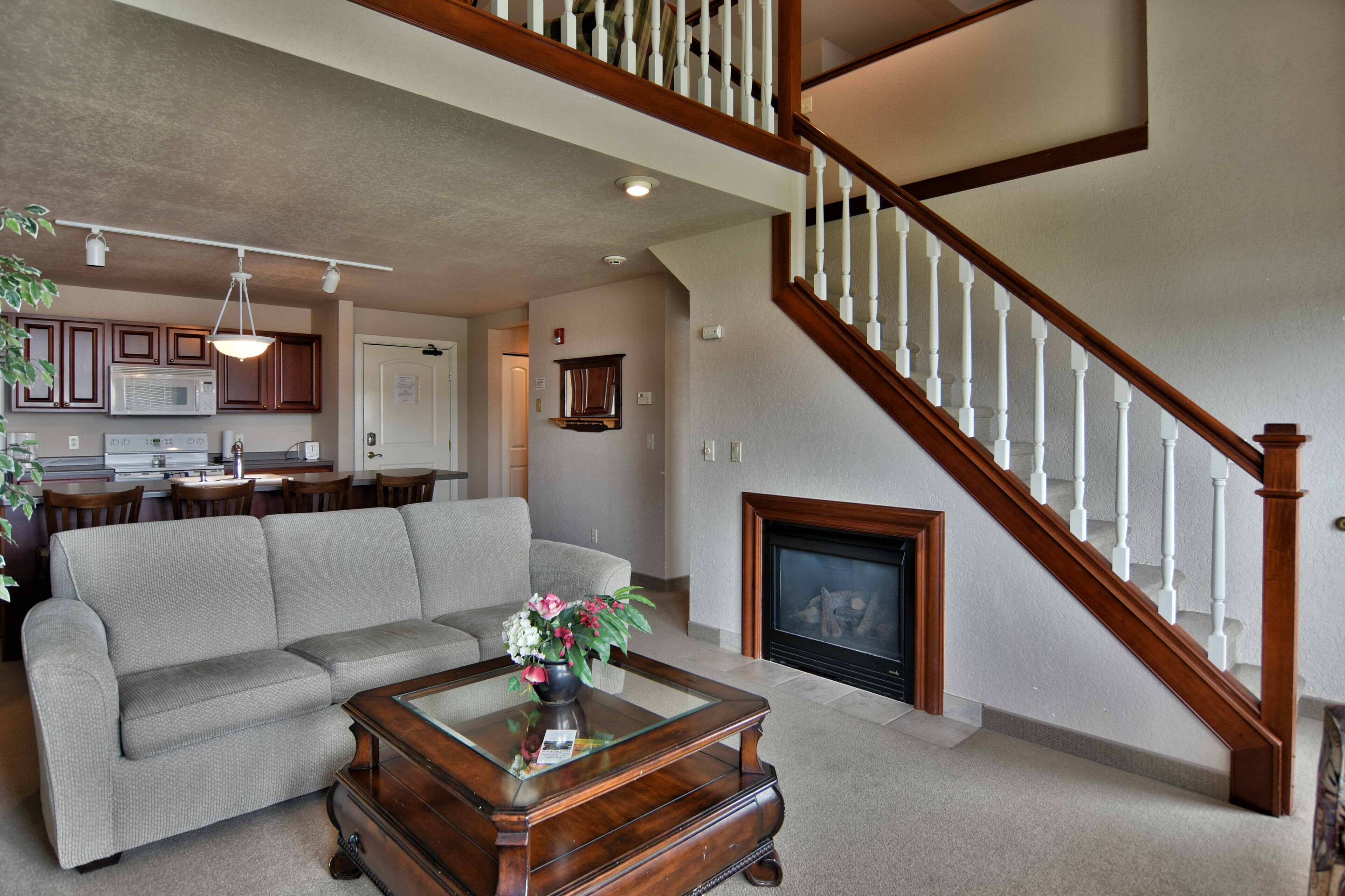 Condo, Multiple Beds, Balcony | Living room | 32-inch TV with cable channels, fireplace