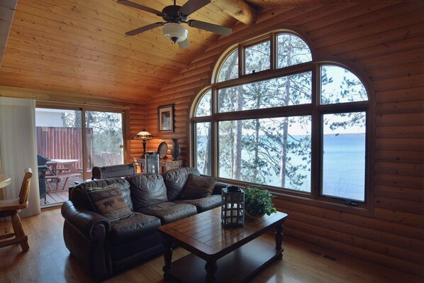 Room, Multiple Beds, Patio | Living area | 32-inch TV with cable channels, fireplace