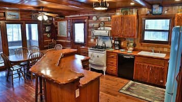 House, Multiple Beds, Jetted Tub | Private kitchen | Fridge, microwave, stovetop, dishwasher