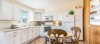 This centrally located 1 bedroom features a full size pool and electric vehicle charging on site.