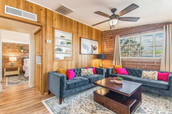 TV, offices - This centrally located 1 bedroom features a full size pool and electric vehicle charging on site. (Tucson)