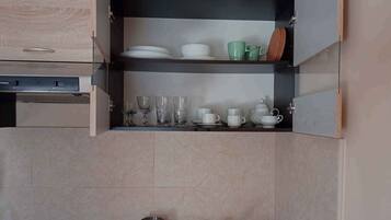 Fridge, stovetop, coffee/tea maker, toaster