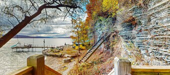 Lakefront contemporary gem with decks, lake views & pebble beach