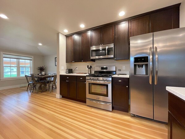 Enjoy cooking in this fully equipped kitchen with a dining area.