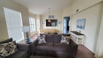 Condo, Multiple Beds, Kitchen | Living area | 40-inch TV with cable channels