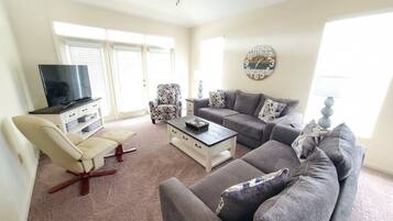 Condo, Multiple Beds, Kitchen | Living area | 40-inch TV with cable channels