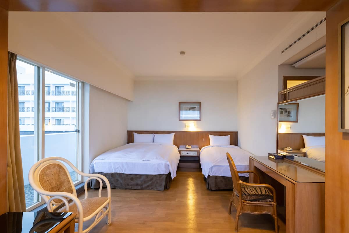 Deluxe Triple Room, Courtyard View | Down comforters, free WiFi, bed sheets