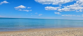 Walk to the Waves: Tudor Living Blocks from the Lake & Zoo