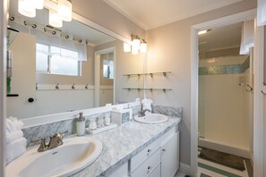 Bathtub, hair dryer, towels, soap