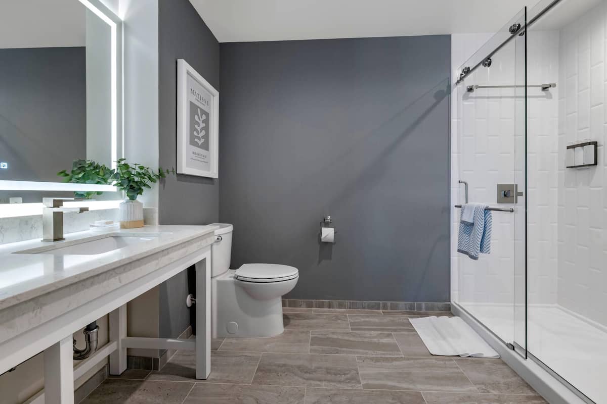 presidential suite, 2 queen beds, accessible, non smoking | bathroom | shower, free toiletries, hair dryer, towels