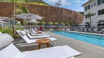 Outdoor pool, open 8:00 AM to 10:00 PM, cabanas (surcharge)