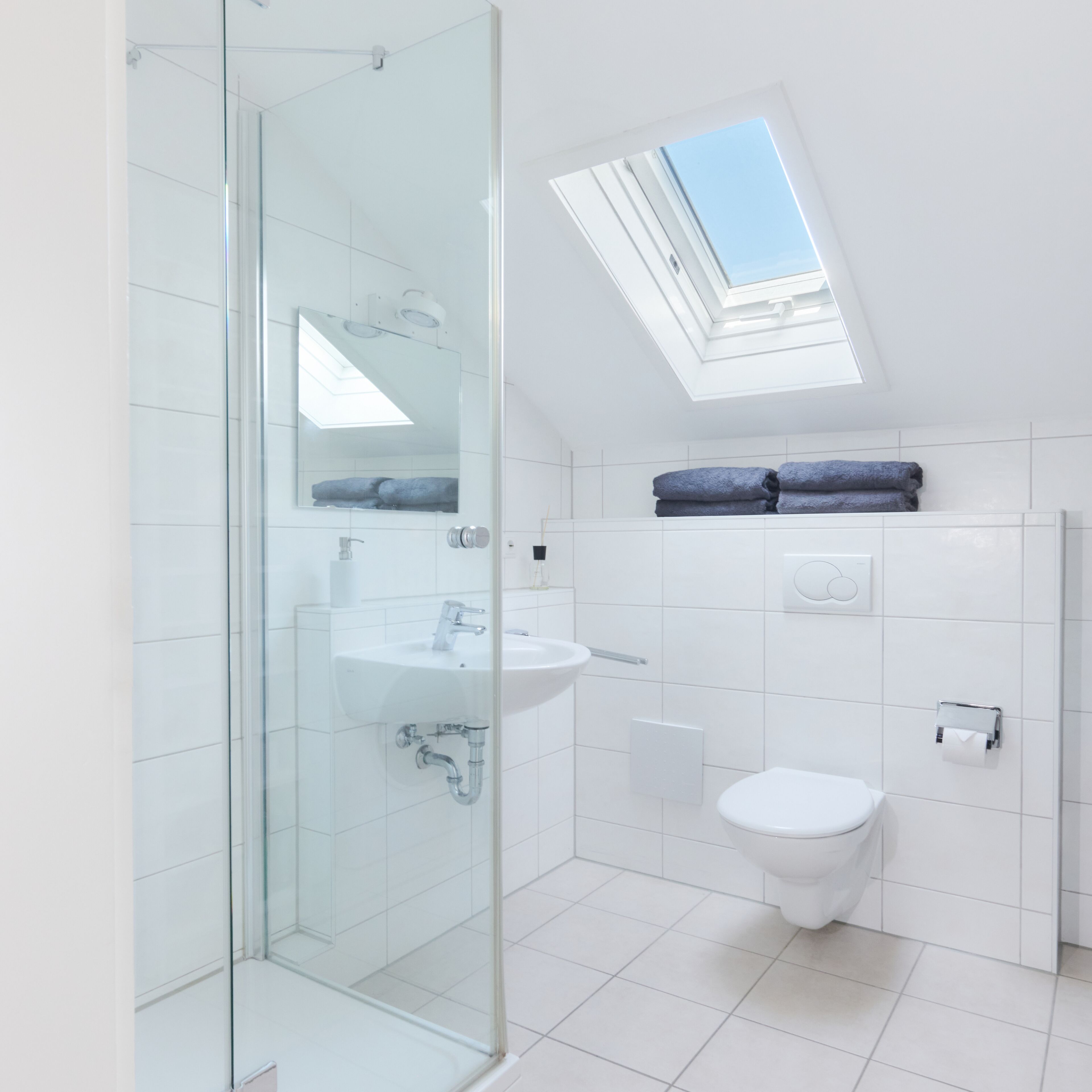 City Condo | Bathroom | Shower, towels, soap, toilet paper