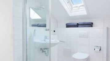 City Condo | Bathroom | Shower, towels, soap, toilet paper