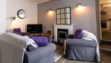 Apartment | Living room | 30-inch TV with digital channels, fireplace