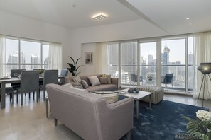 Luxury Apartment | Living area | 42-inch LCD TV with cable channels, TV, Netflix