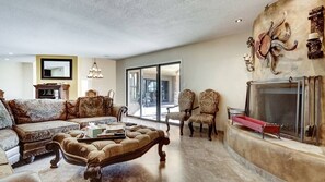 Studio (4 Bedrooms) | Living area | 50-inch TV with cable channels