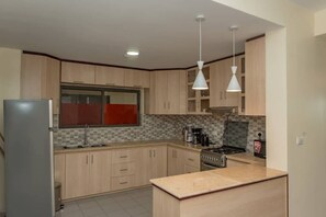 Microwave, oven - 2 bedroom apartment at Vision City (Kigali)