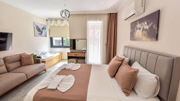 Queen Studio Room With Jacuzzi 203-204 | Premium bedding, Select Comfort beds, desk, laptop workspace