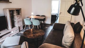 Comfort Apartment | Living area | 120-inch flat-screen TV with digital channels, TV