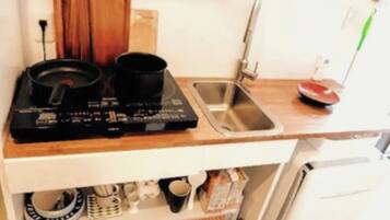 Fridge, microwave, cookware/dishes/utensils