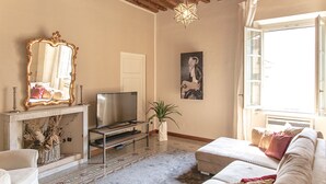 Departamento Deluxe, 4 habitaciones | Área de sala de estar
