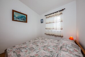 Departamento, varias camas | 2 habitaciones, tabla de planchar con plancha y wifi gratis 