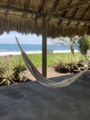 On the beach, sun loungers