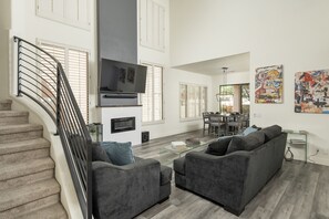 Smart TV, fireplace, books