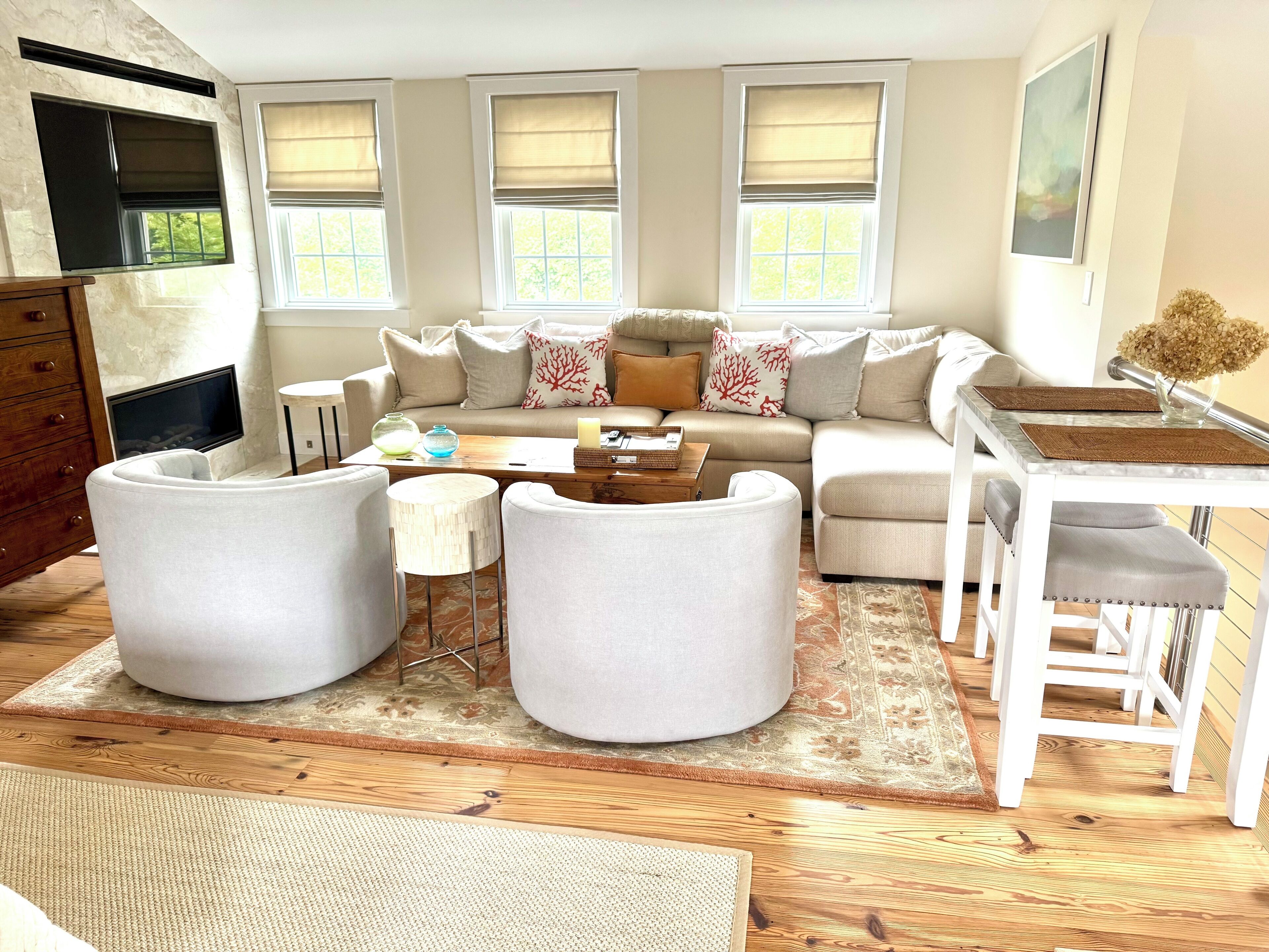 Living room with 52" flat screen tv and gas fireplace (available only in winter)