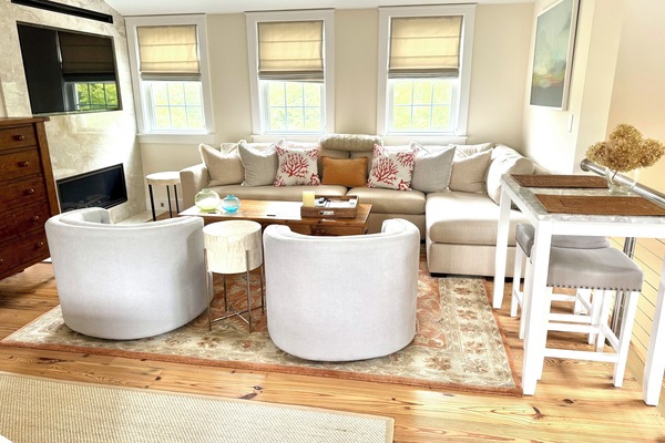 Living room with 52" flat screen tv and gas fireplace (available only in winter)