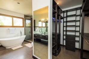 Bathtub, hair dryer, towels, soap
