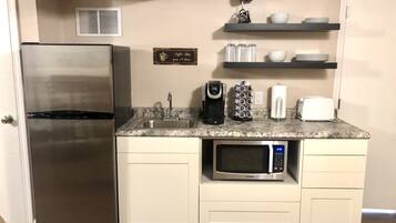 Microwave, coffee/tea maker, cookware/dishes/utensils