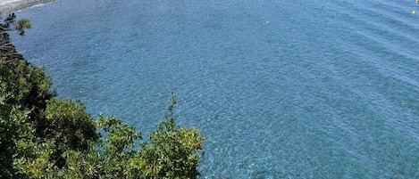 Una spiaggia nelle vicinanze, teli da spiaggia