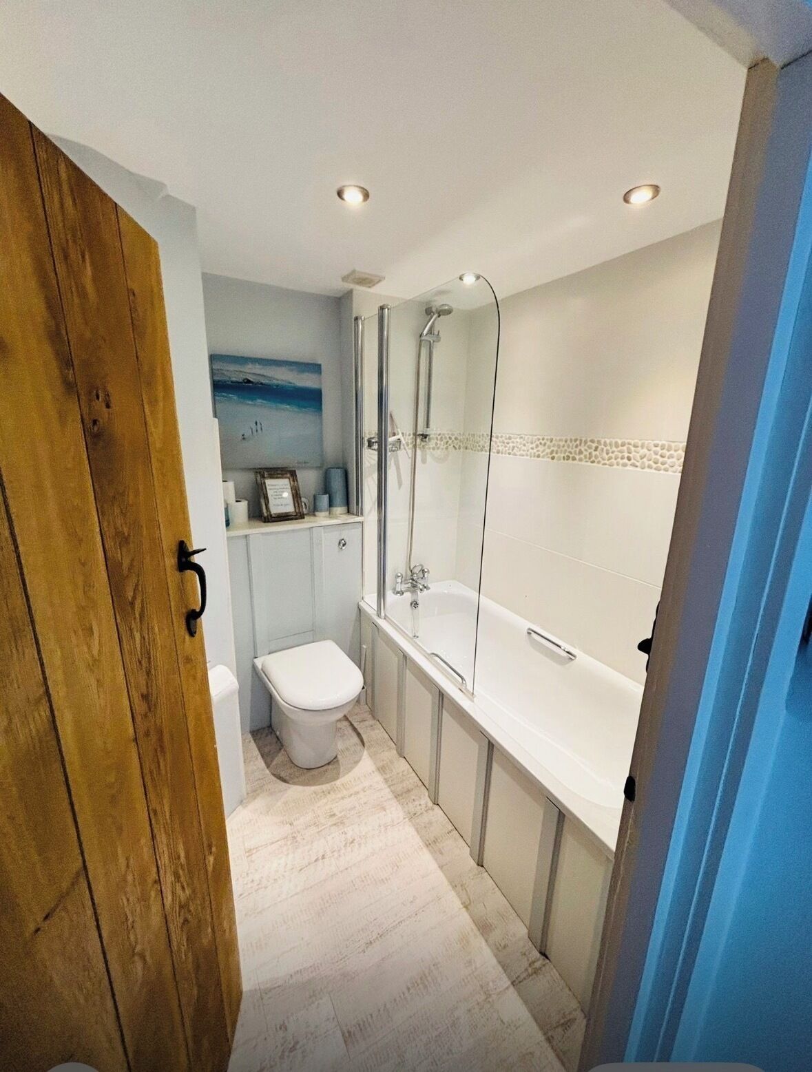 Combined shower/bathtub, towels, soap