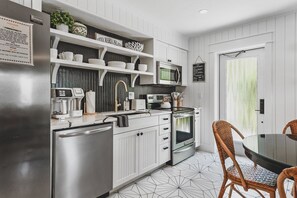 Villa, 2 Bedrooms | Private kitchen - Sandpail 203 71st St West 2 Bedroom Villa by RedAwning (Holmes Beach)