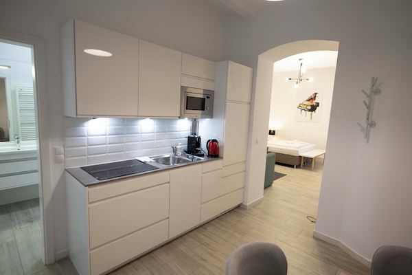 Apartamento | Cozinha privada | Geladeira grande, fogão, cooktop, lava-louças