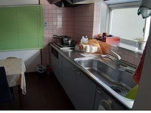 Fridge, microwave, stovetop, cookware/dishes/utensils