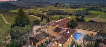 Escape to Paradise: A Stunning Tuscany-Style Home with Views of Vineyards