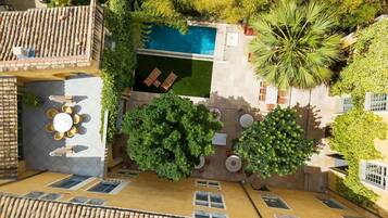 Outdoor pool, open 7:00 AM to 6:30 PM, sun loungers