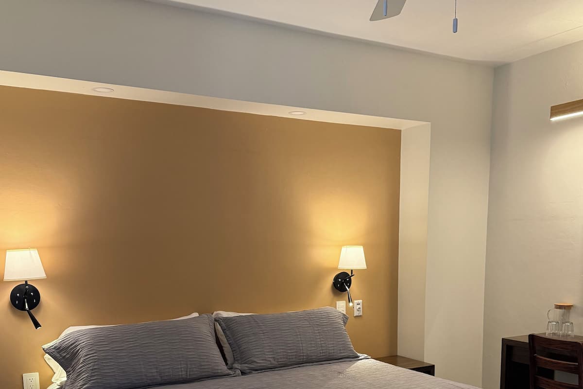 Deluxe Room | Down comforters, desk, laptop workspace, free WiFi