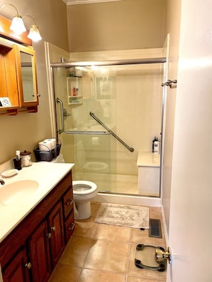 Shower, hair dryer, towels, soap