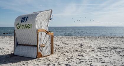 Modern apartment near the beach with beach chair