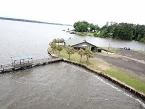 Enjoy serene lakeside views from the dock and relax in the peaceful surroundings.